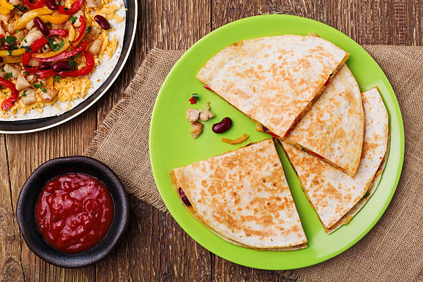 istock Quesadilla with chicken, served with guacamole or salsa sauce. 512396850