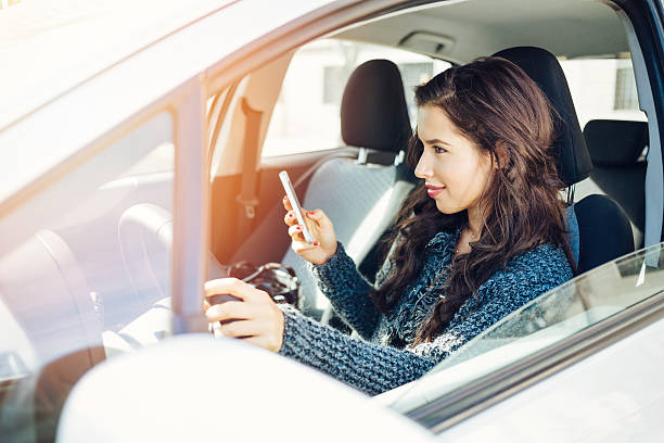 istock Young girl texting on cell phone 512397380