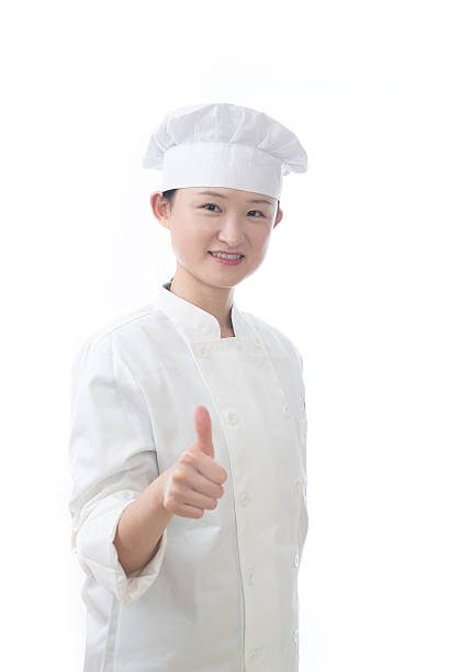 istock Chef woman. Baker. Isolated on white background. 512400706