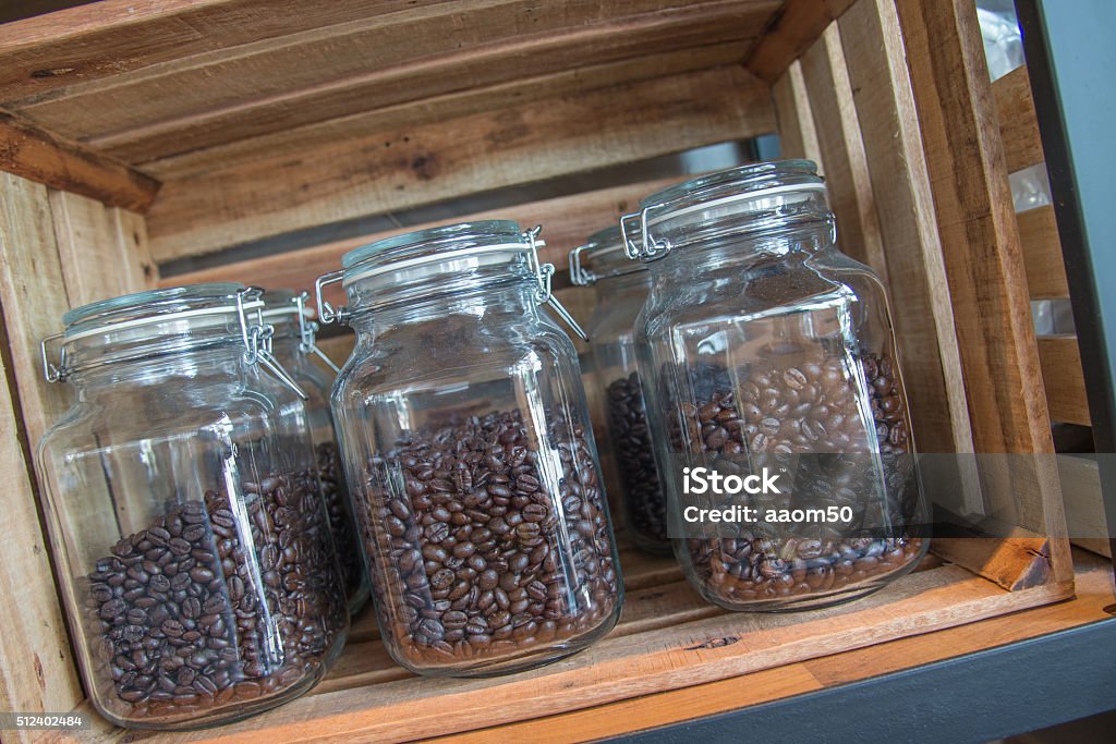 Kaffeebohnen in eine Glas-Teekanne - Lizenzfrei Anreiz Stock-Foto