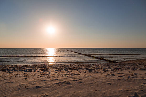 istock sunset at the sea and beach 512404196
