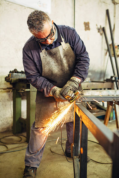 istock Metal Worker Working in factory 512404484