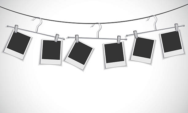 Blank photo frame hanging on a rope with clothes hanger Vector EPS 10 format metal clip stock illustrations