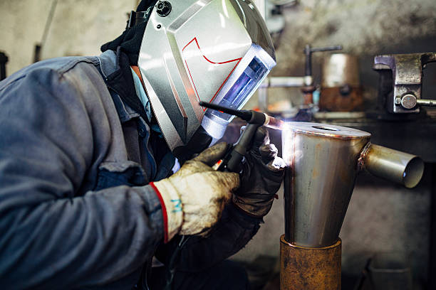 istock Metal Worker Welding in factory 512406244