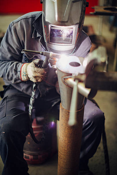 istock Metal Worker Welding in factory 512407062