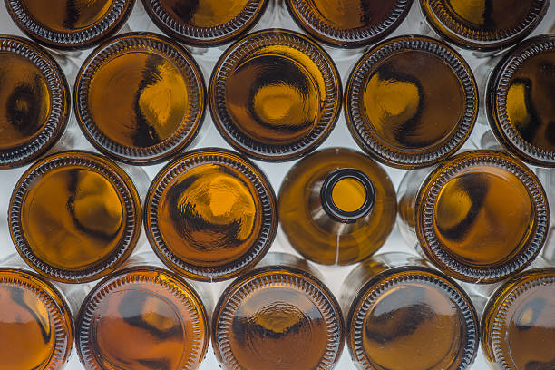istock Beer bottles of brown glass background 512407490