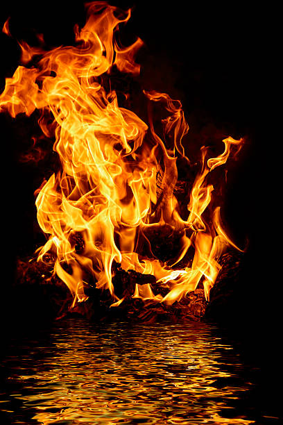 istock campfire and water in the night for backgrounds and compositions 512407738