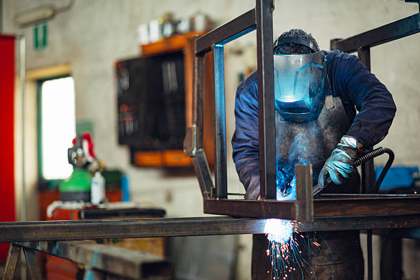 istock Metal Worker Welding in factory 512408678