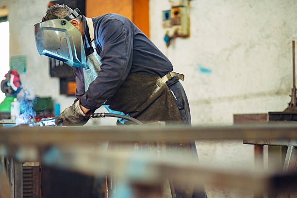istock Metal Worker Welding in factory 512410328