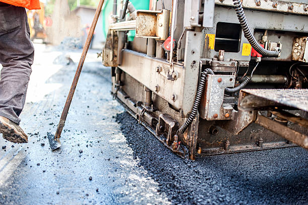 istock road construction with tools, workers and industrial machinery 512415923