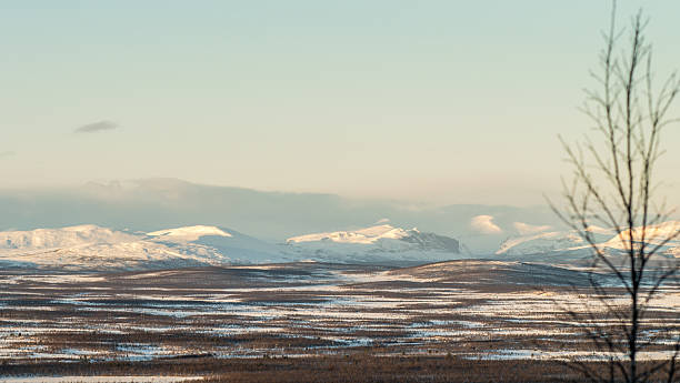 istock Arctic mountainous terrain with low sunlight during winter daytime 512419583