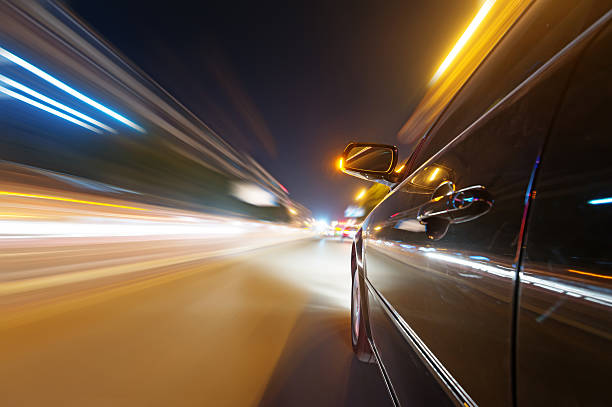 istock car on the road with motion blur background 512419797