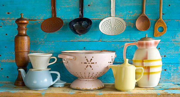 istock various vintage kitchen utensils,against blue wooden wall 512421593