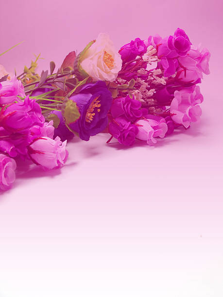 istock Bouquet Pink Flowers with Purple Tone Background 512422619
