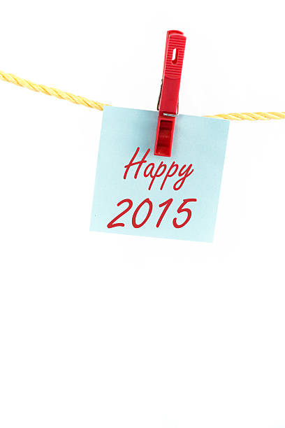 istock Note colored paper With the word Happy 2015 512423217