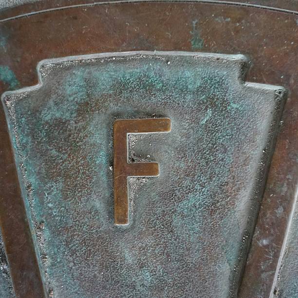 istock Letter F Aged Bronze 512435534