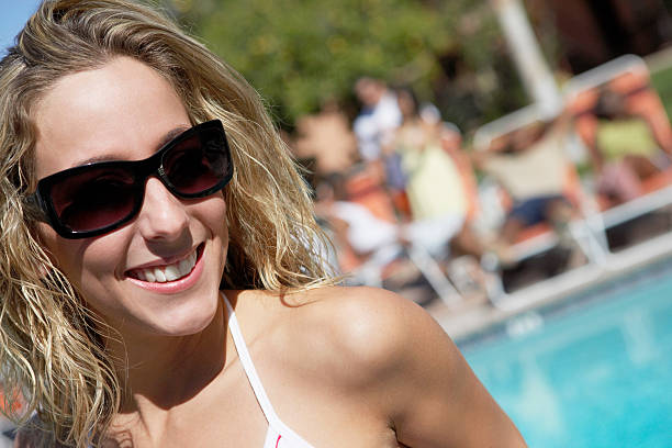 istock Girl Beside the Pool 512449927