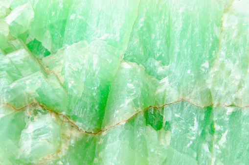 Emerald ornamented jewel, close-up.