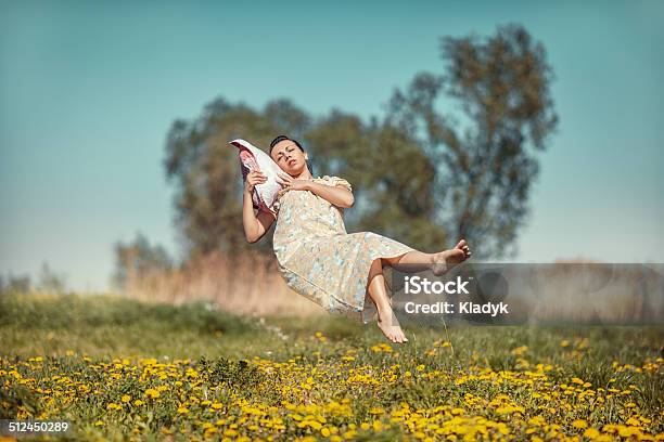 Girl With Pillow Soars Stock Photo - Download Image Now - Sleeping, Flying, Levitation