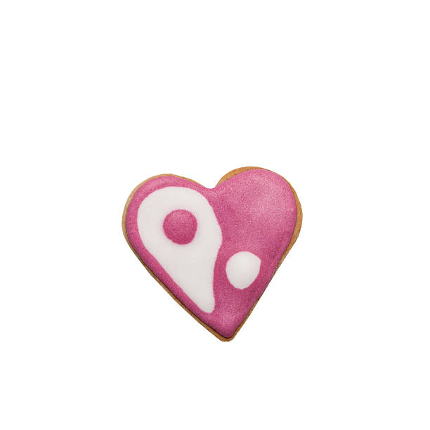 istock Homemade gingerbread cookie with colored frosting isolated on a 512452634