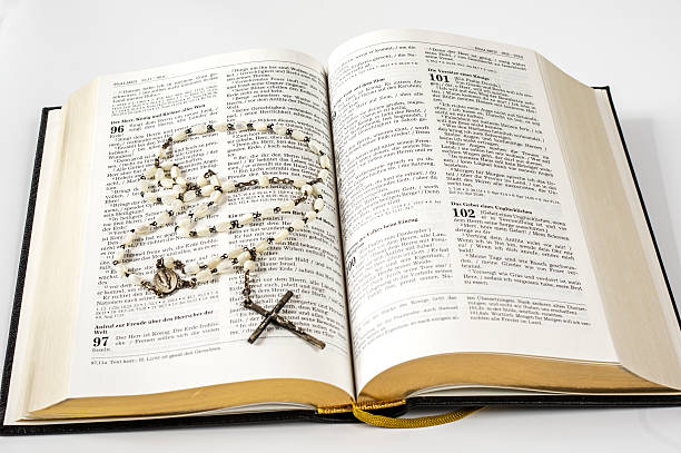 istock Holy bible and rosary beads 512452796