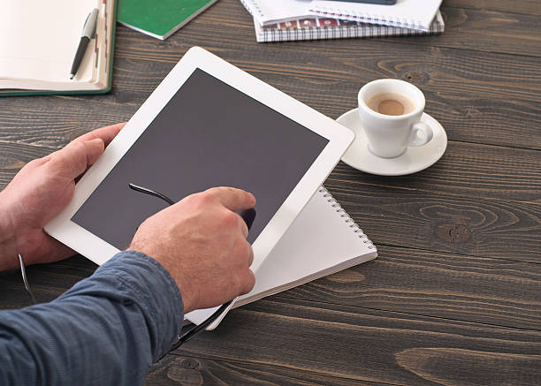 istock Tablet computer in the hands of men 512453738
