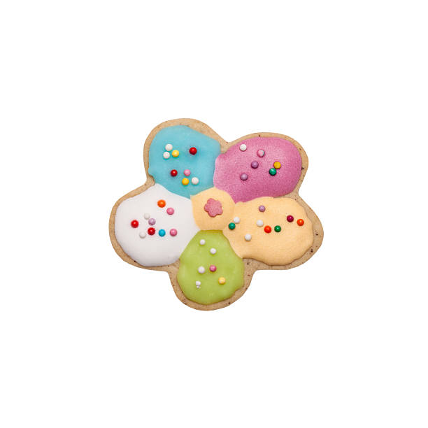 istock Homemade gingerbread cookie with colored frosting isolated on a 512454354