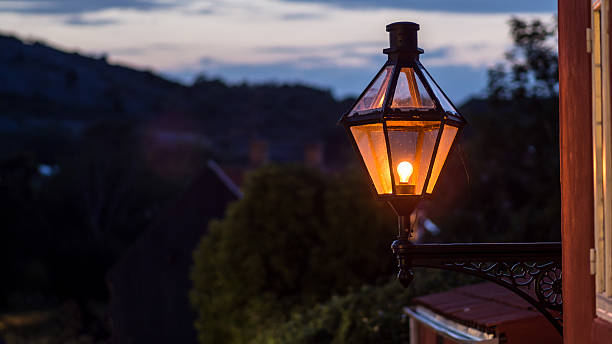 istock Old street lamp with Carbon filament bulb 512454781