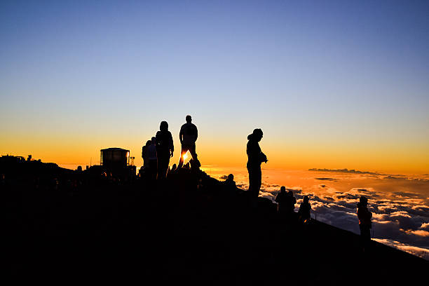 istock Tourists watching sunset on Haleakala Summit - Maui, Hawaii 512455012