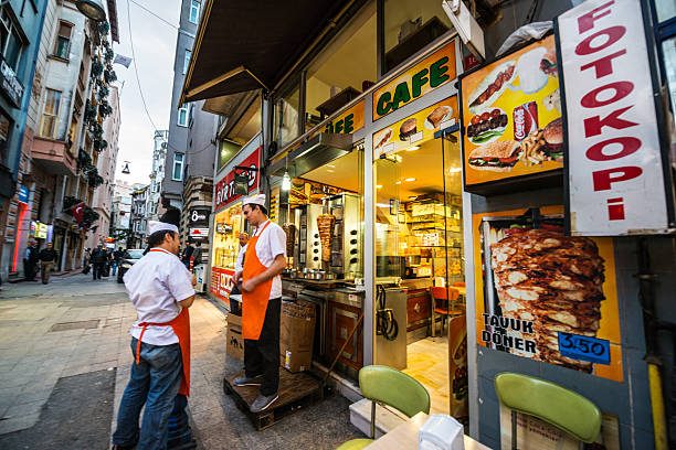 Istanbul, Turkey  - October 23, 2014: Cafe vendors talking outside, Istanbul, Turkey