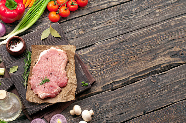 istock juicy piece of meat with vegetables 512455232