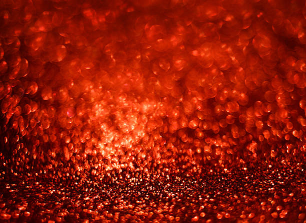 istock Shiny  red glitter bokeh christmas background 512455472