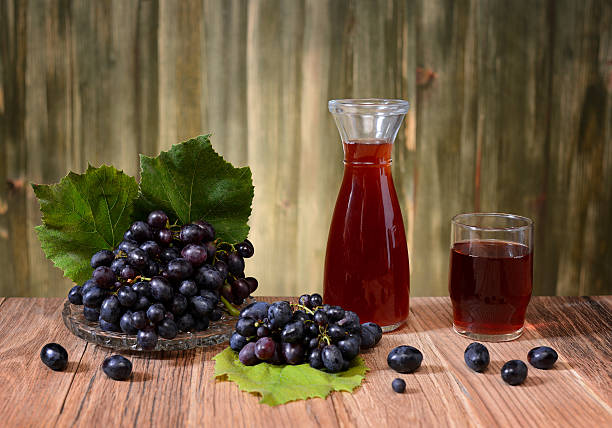 istock Fresh grapes and wine in the bottle 512456257