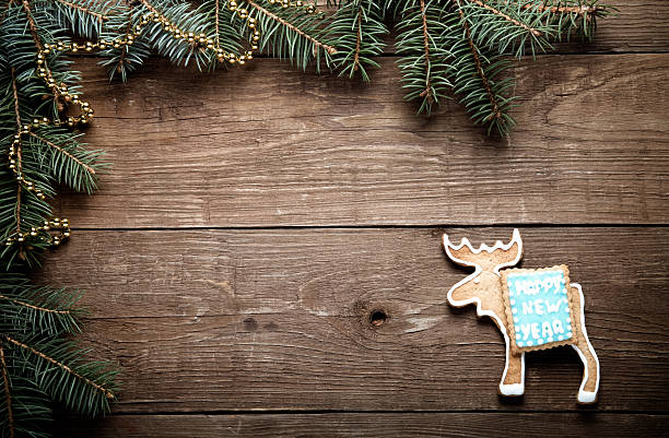 istock Gingerbread homemade cookies with icing and christmas tree branc 512456348