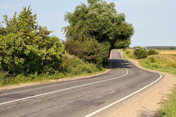istock picturesque country road 512456466