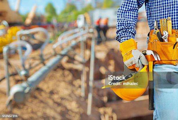 Copycpace Image Of Close Up Worker Holding Hellmet Stock Photo - Download Image Now - Adult, Blue, Building Contractor