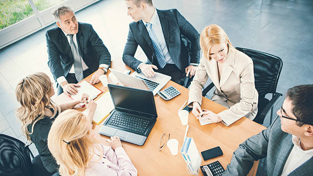 istock Group of businesspeople in a meeting. 512459176