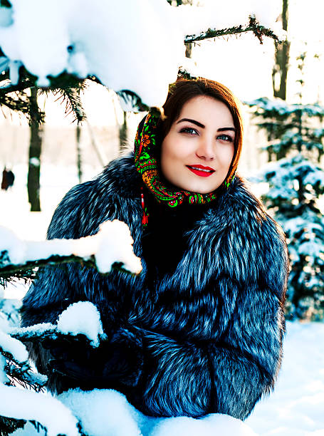istock woman in the winter park 512471432