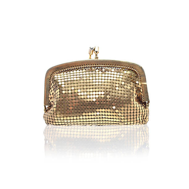 istock Golden coin purse isolated on white 512473470