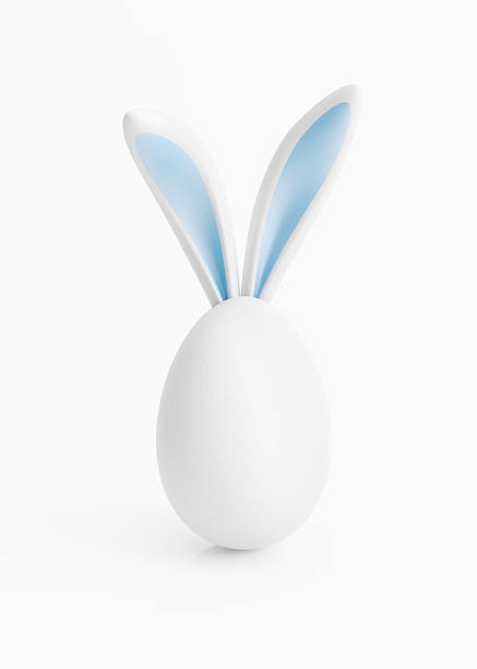 Easter Egg with Blue Bunny Ears Easter egg with blue bunny ears. Isolated on white background. Clipping path is included. Great use for easter concepts. animal ear stock pictures, royalty-free photos & images