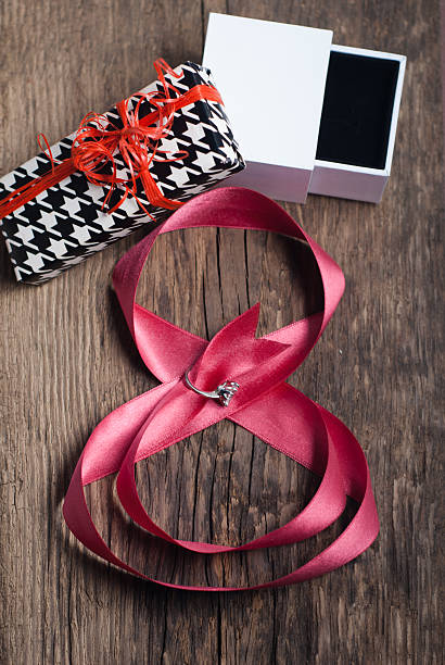 istock Beautiful pink ribbon with ring 512474960