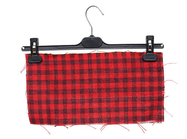 istock clothes hanger with hanging on it a piece of  cloth. 512475677