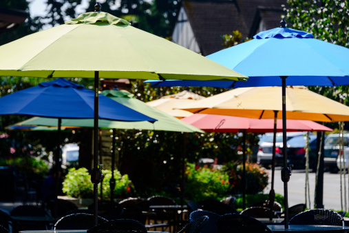 Colorful umbrellas at an outdoor sidewalk cafe