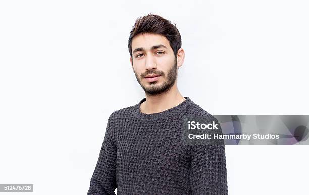 Portrait Of Young Man Over Isolated On White Stock Photo - Download Image Now - Cut Out, Men, Attitude