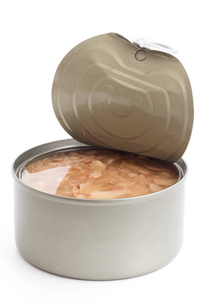istock Open can with lid partly attached. Tuna in brine. 512476785