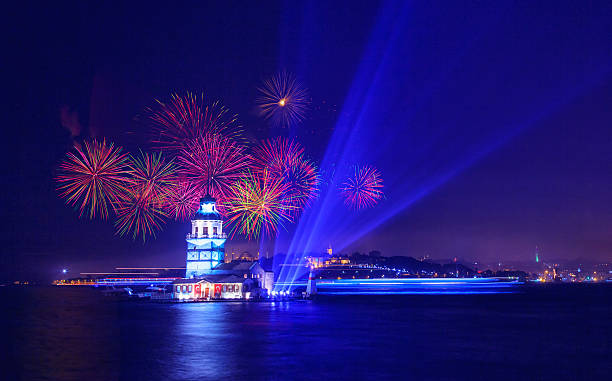 Maiden's Tower / Kiz kulesi with fireworks Indipendent day celebration with colorful firework display and laser light show over Bosphorus, Istanbul. maidens tower turkey photos stock pictures, royalty-free photos & images