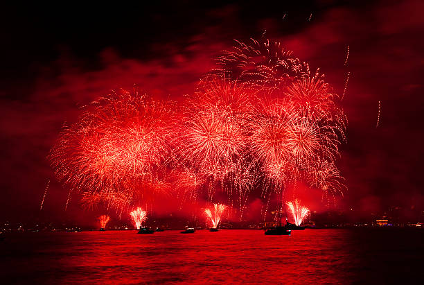Amazing big red fireworks over the sea