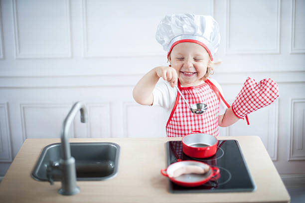 Cute little cook stock photo