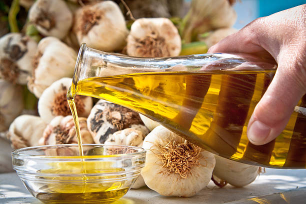 Extra-virgin olive oil and garlic stock photo