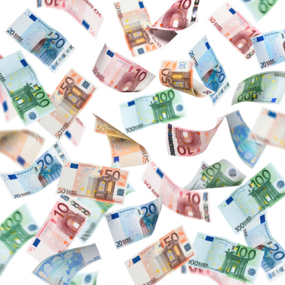 Falling Euro banknotes isolated on white background